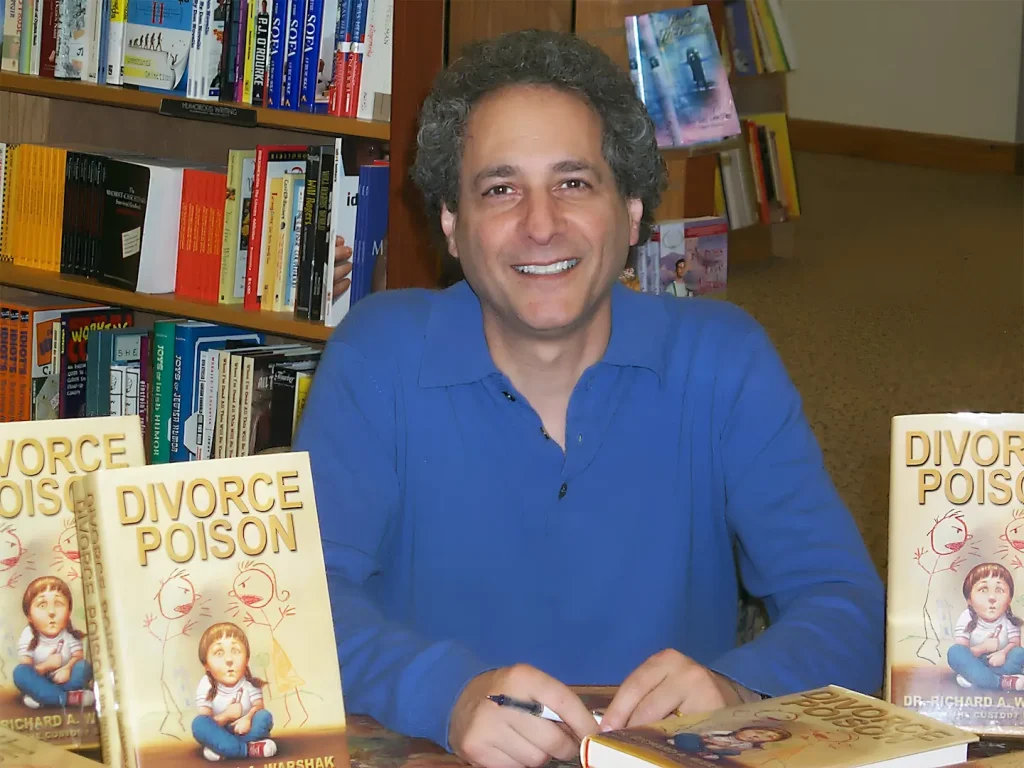 Learn about Dr Richard Warshak pictured at his Divorce Poison book signing.